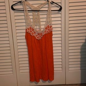 Orange & white tank top.